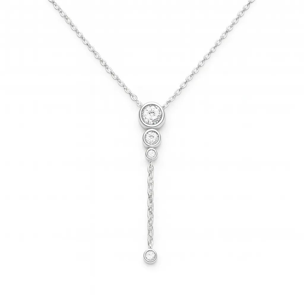 Feine Damen Halskette aus 925 Sterling Silber mit Y-Anhänger: drei rund gefasste Zirkonia in absteigender Größe und kurze herabhängende Kette mit Solitär-Zirkonia, vor weißem Hintergrund.