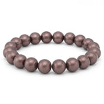 Elastisches Armband aus runden, glänzenden Perlen in schimmerndem Dunkelgrau auf weißem Hintergrund.