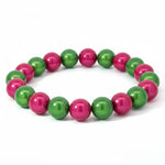 Entdecke das 3D Wonderperlen Armband in Pink und Grün – ein handgefertigtes Schmuckstück, das Lebendigkeit symbolisiert und jeden Look perfekt unterstreicht.
