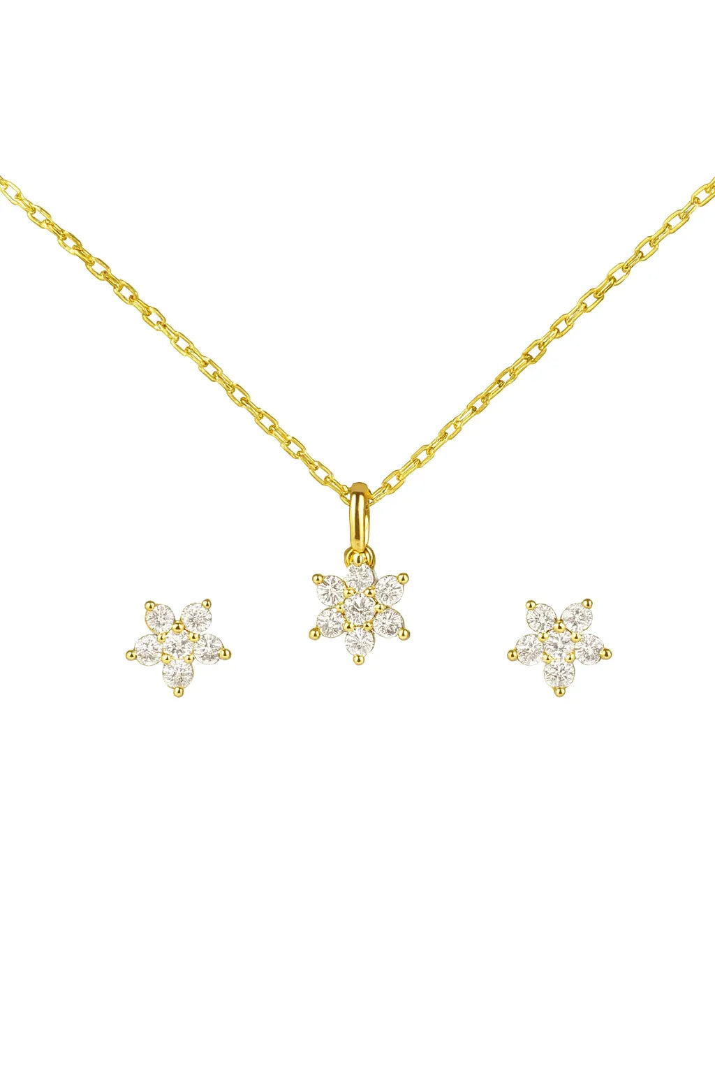 Goldenes Schmuckset bestehend aus einer feinen Halskette mit blütenförmigem Anhänger und passenden Ohrsteckern, besetzt mit funkelnden Zirkonia-Steinen, vor weißem Hintergrund.