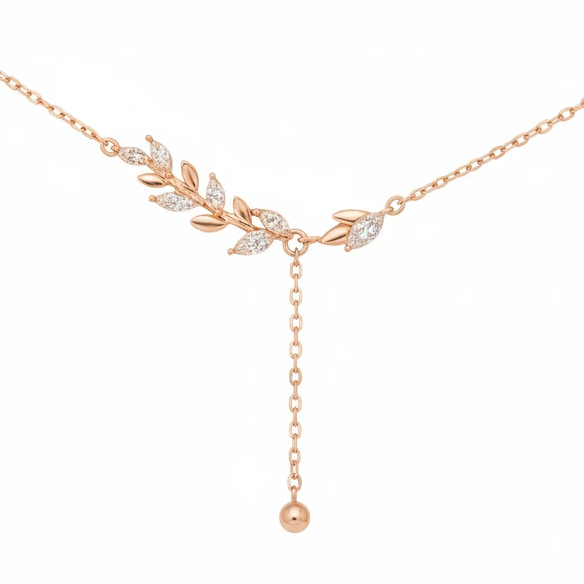 Damen Halskette aus rosévergoldetem 925 Sterling Silber mit filigranem Blätterdesign, funkelnden Kristallen und herabhängender Y-Kette im modernen, femininen Stil.