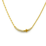 Vergoldete Damenhalskette aus 925 Sterling Silber mit leicht gebogenem, seitlichem Kreuzanhänger, besetzt mit funkelnden Zirkonia-Steinen, für Frauen, die dezenten Glaubensschmuck lieben.