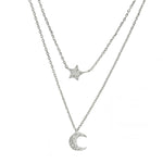 Filigrane Damenhalskette aus 925 Sterling Silber mit zwei Lagen und funkelnden Mond- und Sternanhängern aus Zirkonia, ideal für trendbewusste Frauen zu Alltag und Abend.