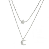 Filigrane Damenhalskette aus 925 Sterling Silber mit zwei Lagen und funkelnden Mond- und Sternanhängern aus Zirkonia, ideal für trendbewusste Frauen zu Alltag und Abend.
