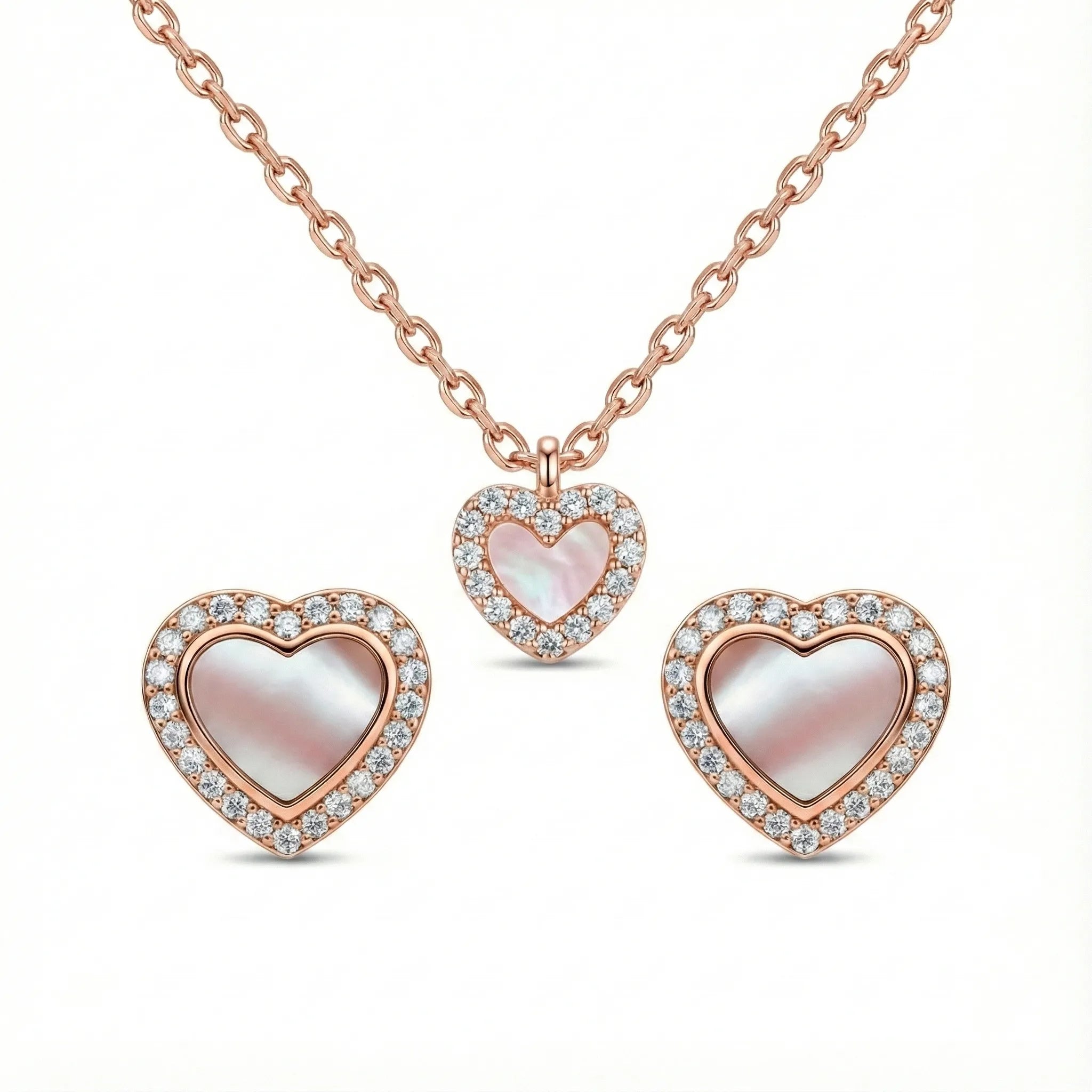Rosévergoldetes Schmuckset aus 925 Silber mit Herzanhänger und passenden Herz-Ohrsteckern, Perlmutt-Einlage und funkelnden Zirkonia – romantisches Damen Set Halskette und Ohrringe.
