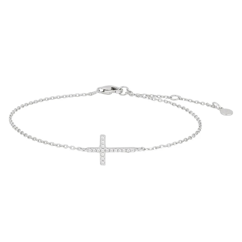 Dieses feine Damenarmband aus 925 Sterling Silber, wahlweise vergoldet oder in Silber, zeigt ein seitliches Kreuz mit Zirkonia-Besatz und richtet sich an stilbewusste Frauen.