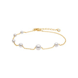 Filigranes Damenarmband aus 925 Sterling Silber mit feiner Kette, mehreren weißen Süßwasserperlen und kleinem Zirkonia-Anhänger, ideal für stilbewusste Frauen.