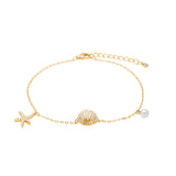 SelinaNor Armband aus 925 Sterling Silber, 18 Karat vergoldet, mit Seestern, Muschel, Perle und Zirkonia.