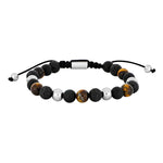 Dieses Herrenarmband besteht aus schwarzen Lava- und Achatperlen mit Tigerauge, kombiniert mit Edelstahl-Elementen und richtet sich an stilbewusste Männer.