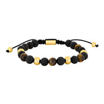 Herrenarmband mit schwarzen Achat- und Lavaperlen sowie Tigerauge, goldfarbenen Edelstahlakzenten und schwarzem, verstellbarem Makraméband – elegantes, maskulines Design.
