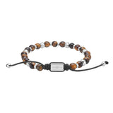 Das Bild zeigt ein verstellbares Unisex-Perlenarmband aus gelbem Tigerauge mit silbernen oder goldfarbenen Edelstahlelementen und schwarzer Textilkordel, ideal für stilbewusste Damen und Herren.
