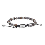 Auf dem Bild ist ein verstellbares Unisex-Perlenarmband aus Map Stone und Ilmenit-Bronzitit mit schwarzer Kordel und silbernen oder goldfarbenen Edelstahlelementen zu sehen, ideal für stilbewusste Damen und Herren.