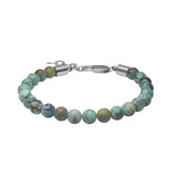 Herrenarmband mit runden Perlen aus afrikanischem Türkis und robustem Edelstahlverschluss, ein natürliches Schmuckstück für stilbewusste Männer.