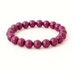 3D Wonderperlen Armbands mit glänzenden, runden Perlen in kräftigem Magenta, auf weißem Hintergrund präsentiert.