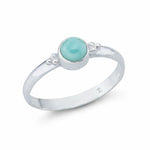 Eleganter Damenring aus 925er Sterlingsilber mit rundem Aqua Calcedon Edelstein in Zargenfassung.